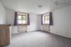 Solides Zweifamilienhaus mit Garten, Garage und Carport in ruhiger Ortsrandlage - Schlafzimmer_II_EG