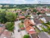 Solides Zweifamilienhaus mit Garten, Garage und Carport in ruhiger Ortsrandlage - Außenansicht IV