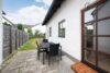 Solides Zweifamilienhaus mit Garten, Garage und Carport in ruhiger Ortsrandlage - Terasse_EG