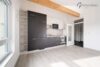Kapitalanlage oder Eigennutzung: Modernes Single-Apartment mit TG-Stellplatz nahe S1 Eching - Wohn-Schlafraum mit EBK 5